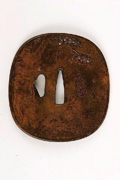 Garde de sabre ornée d'un homme en kimono_1