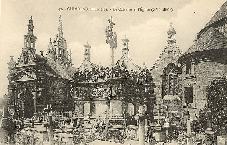42. - GUIMILIAU (FINISTERE) - LE CALVAIRE ET L'EGLISE (XVIE SIECLE)_0