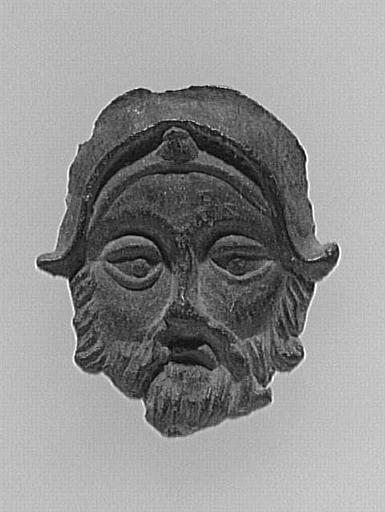 FRAGMENT D'ENSEIGNE DE PÈLERINAGE : TETE D'HOMME BARBU_0