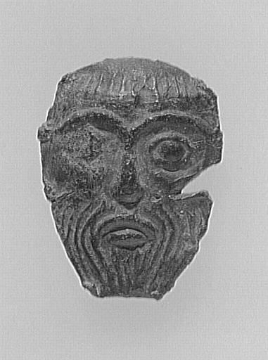 FRAGMENT D'ENSEIGNE DE PELERINAGE : TETE D'HOMME BARBU_0