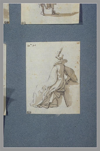 Un personnage de théâtre assis sur un banc_0