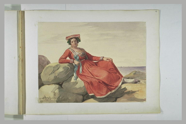 Femme en costume italien, assise sur des rochers, au bord de la mer_0