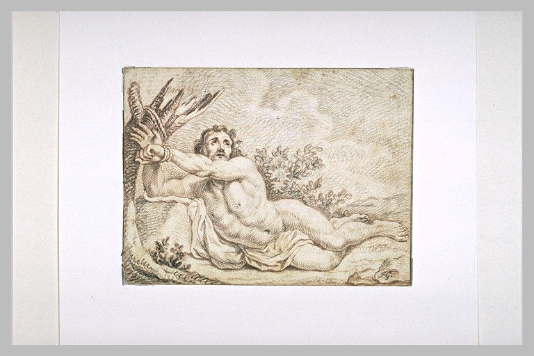 Homme nu, couché, les mains attachées à un tronc d'arbre_0