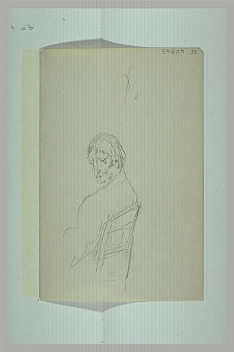Homme assis sur une chaise, le visage tourné de trois quarts à gauche_0