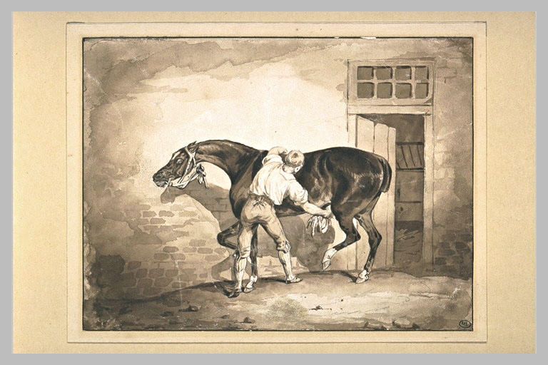 Un palefrenier bouchonnant un cheval à la porte d'une écurie_0