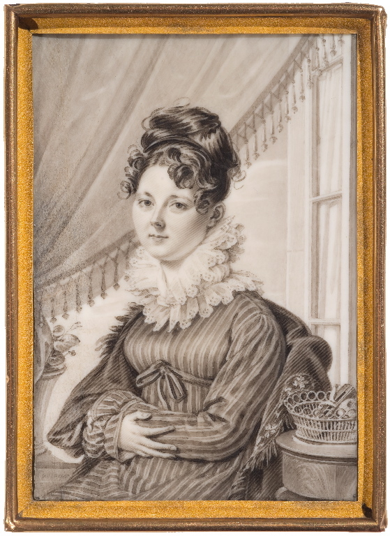 Portrait de jeune femme assise dans un intérieur_0