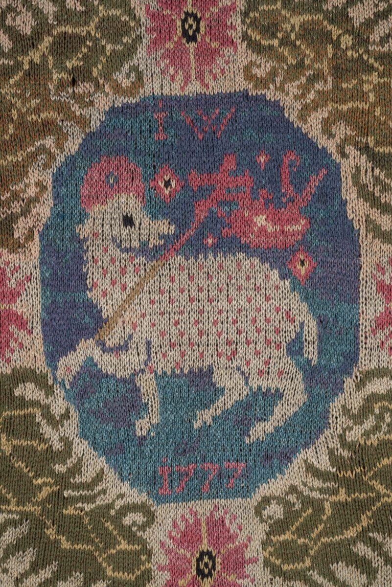 Tapis tricoté à l'agneau pascal provenant de la corporation des bonnetiers de Colmar_0