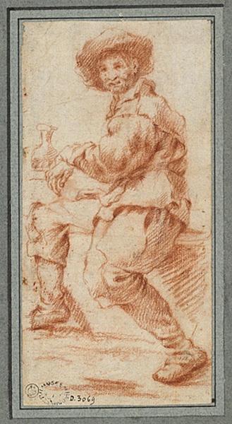 Homme coiffé d'un grand chapeau, assis et accoudé à une table_0