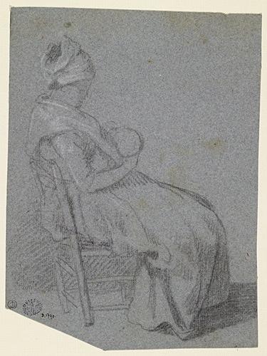 Une femme assise sur une chaise_0