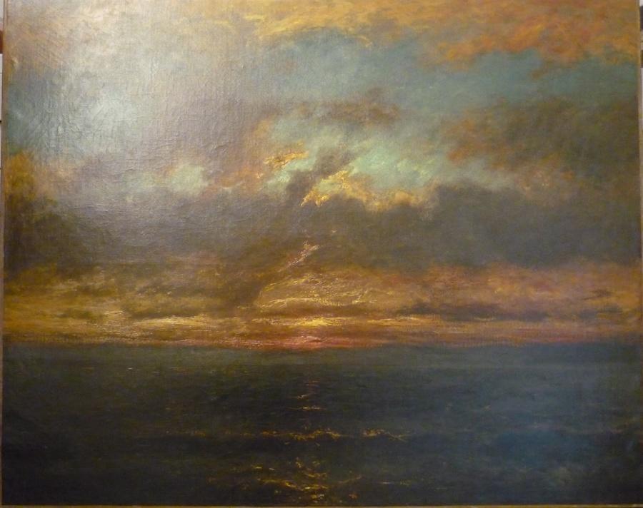Soleil couchant sur un rivage_0