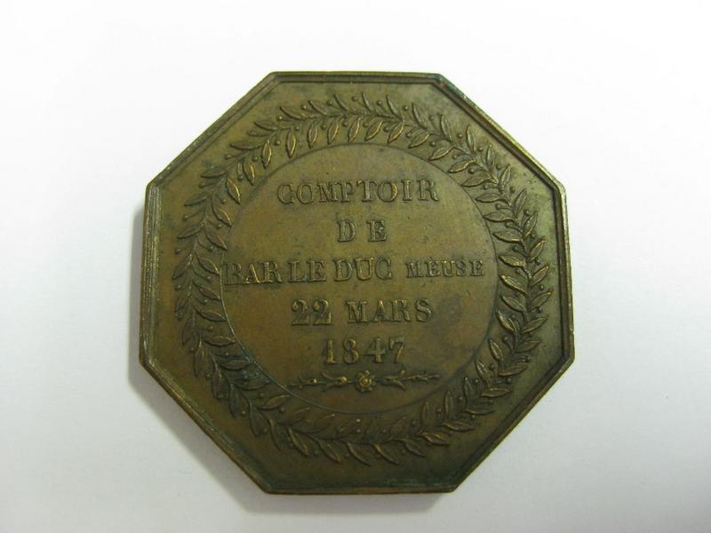 Jeton octogonal, comptoir d'assurances de Bar-le-Duc_1