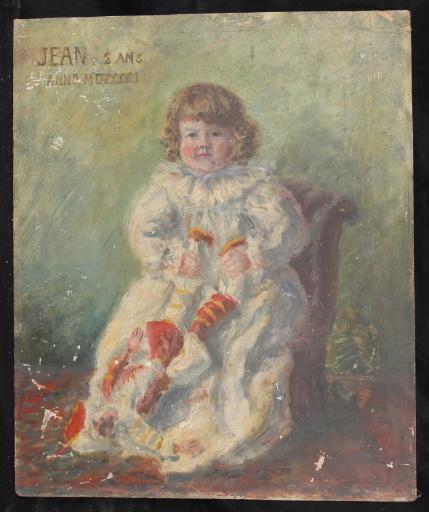 Portrait de Jean assis sur un fauteuil et tenant une marionnette_0