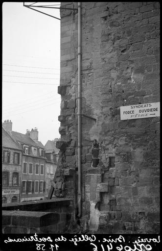 Détail d'un mur en pierre sur rue