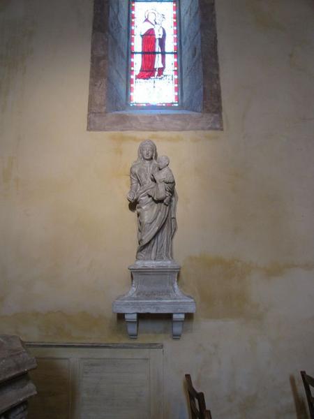 Quatre statues (statuettes) : Christ enfant tenant la croix, Vierge à l'Enfant, Saint évêque et Saint diacre