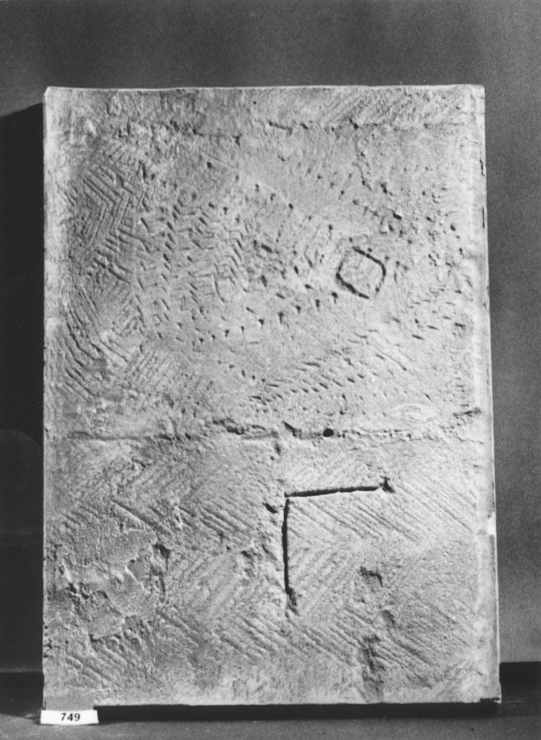 Moulage de signes lapidaires