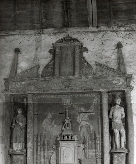 retable latéral nord, panneau peint : Annonciation (l’), statues : Saint Sébastien, saint non identifié