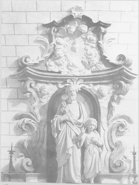 retable à niche, statue : saint Joseph et l'enfant, reliefs (décor sculpté des chapelles latérales du choeur), vue générale