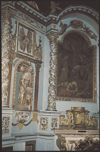 Chapelle, choeur ; retable (partie gauche), tableau, statue : 'La décollation de saint Jean-Baptiste', 'Sainte Anne et la Vierge', colonnes torses, chérubins, angelots, rinceaux végétaux ; 1857 (détail)