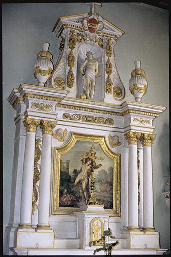 Autel latéral nord ; retable, tableau, statue : 'Saint Sébastien' (tableau et statue), retable architecturé, chérubins, chutes de feuillages