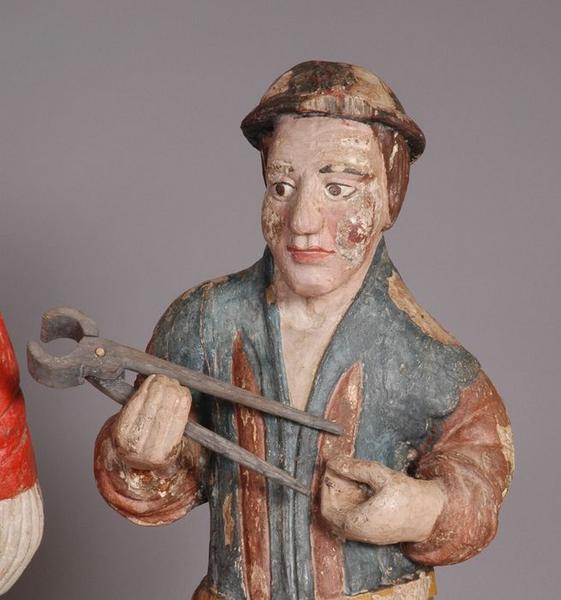 groupe sculpté : Martyre de sainte Apolline (le), détail du visage d'un des bourreaux