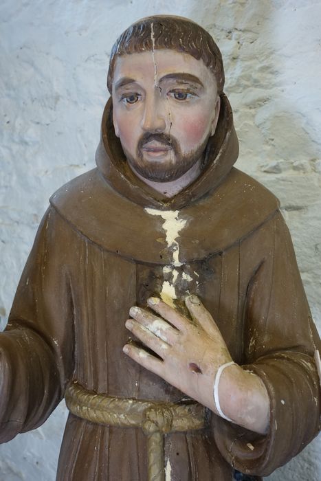 statue : Saint François, vue partielle