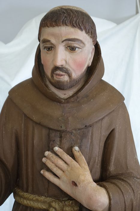 statue : Saint François, vue partielle