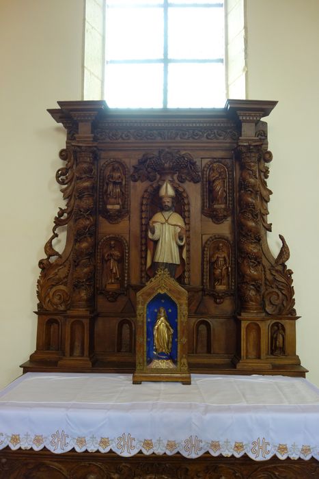 autel, retable, statue : Saint Eloi, vue partielle