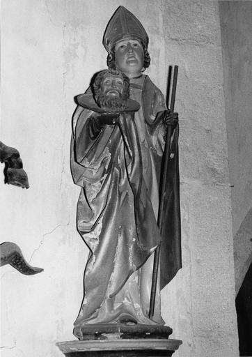 statue : Saint Grat, cephalophore (chef de saint Jean-Baptiste) avec un baton dans la main gauche, bois polychrome