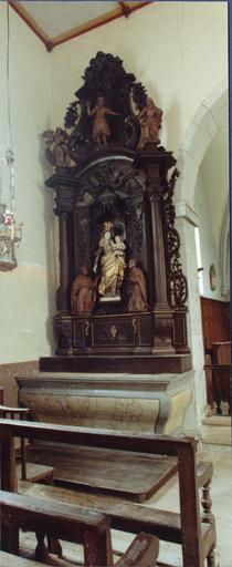 retbale latéral gauche avec statue de la Vierge à l'Enfant entre deux saints ou agenouillés, après restauration