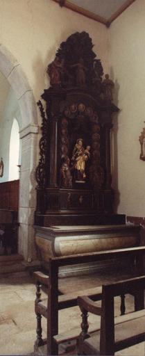 retbale latéral droit avec statue de la Vierge à l'Enfant et médaillons peints, après restauration