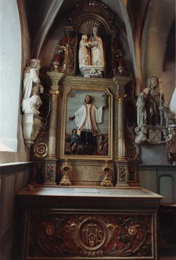 retable latéral nord, et son bas-relief : La Prédication de saint François-Xavier, après restauration