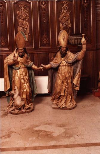 deux statuettes du retable, saints évêques des niches, restauration en 1980-1981