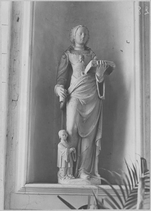 groupe sculpté : Sainte Marguerite (?) accompagnée d'un donateur ecclésiastique