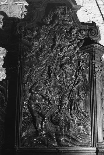 Retable des fonts baptismaux : Le Baptême du Christ, bois sculpté en bas-relief