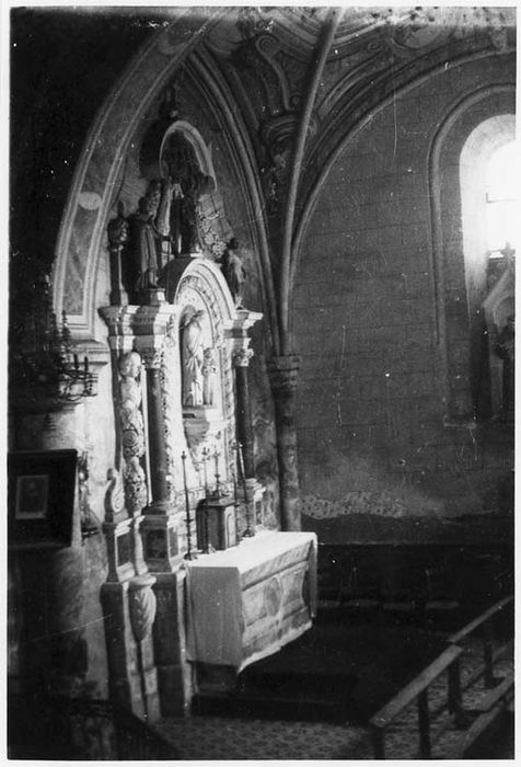 retable de Saint-Jean-Baptiste et quatre statues : Saint Jean-Baptiste, Saint Joseph et l'Enfant Jésus, Saint Eutrope (ou Saint Aignan ?) et Saint Fiacre