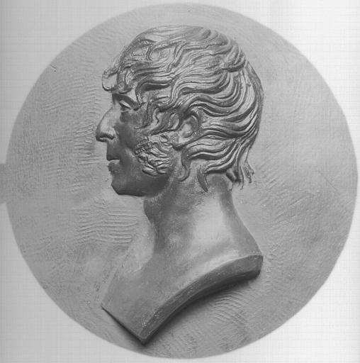 Médaillon en terre cuite rouge recouverte d'un vernis, sculpté en bas-relief : Buste de Chinard
