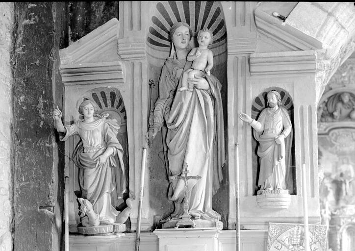 Trois statues en bois : Vierge à l'Enfant, sainte Marguerite, saint Joseph