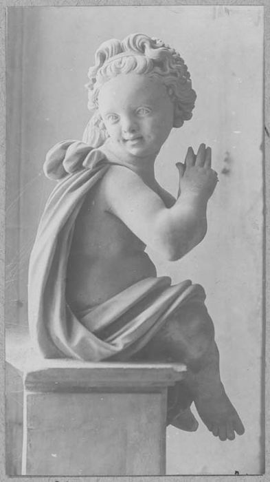 Statuette : enfant en prière