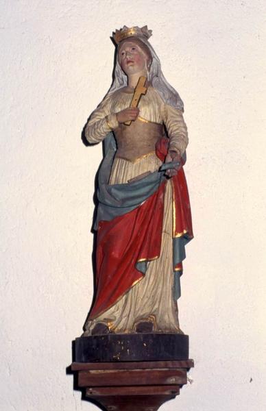 trois statues : Christ en croix, Vierge à l'Enfant et Sainte couronnée - © Monuments historiques