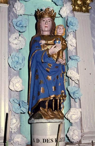 retable et lambris du choeur avec deux statues : Saint Prixe et Notre-Dame des Fleurs et deux chandeliers (portes-cierges) - © Monuments historiques