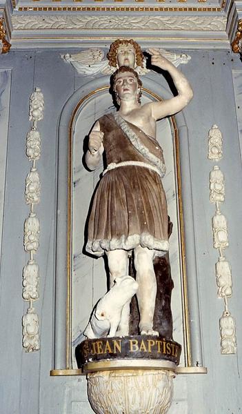 retable latéral sud et deux statues : Saint Jean-Baptiste et Saint François d'Assise