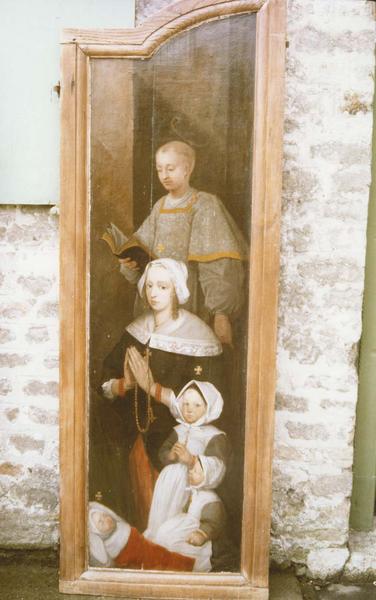 retable (triptyque) : Saint Blaise, homme et femme en donateurs, saint Léonard, détail