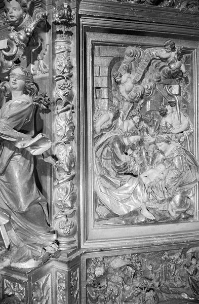 Retable du choeur : premier registre, panneau latéral gauche représentant l'Adoration des bergers