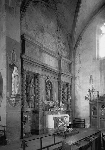 Croisillon sud de la chapelle terminale : retable en bois sculpté