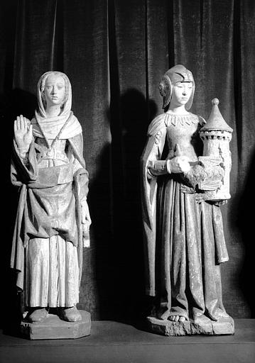 Deux statues en bois : La Foi et La Force