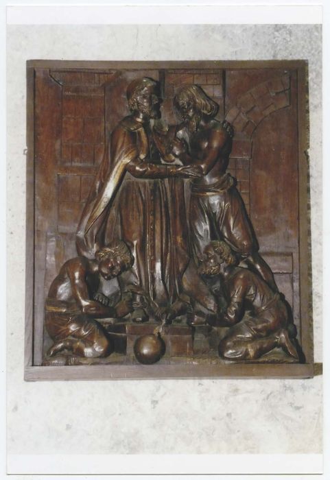 deux panneaux sculptés : Lapidation de saint Etienne et Saint Vincent de Paul entre deux galériens