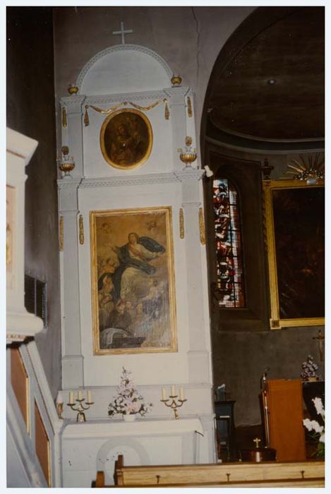 Autel latéral gauche, retable et deux tableaux : l'Assomption et Saint Thomas