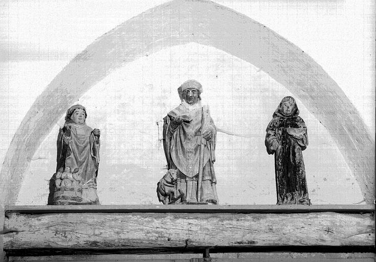 Trois statues en bois : saint Nicolas, saint Eloi, un Moine