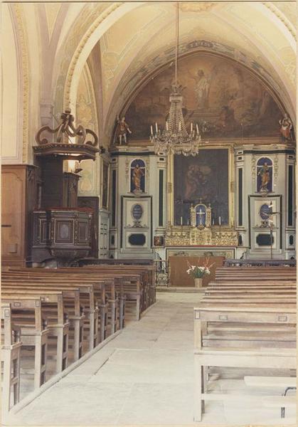 retable, tabernacle, gradins d'autel, reliquaire-monstrance, lambris de revêtement, statues : saint Pierre, saint Michel, saint Paul, saint Jean, vue générale