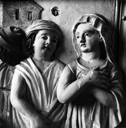 retable croisillon nord, haut-relief : L'Adoration des Bergers, détail berger et bergère